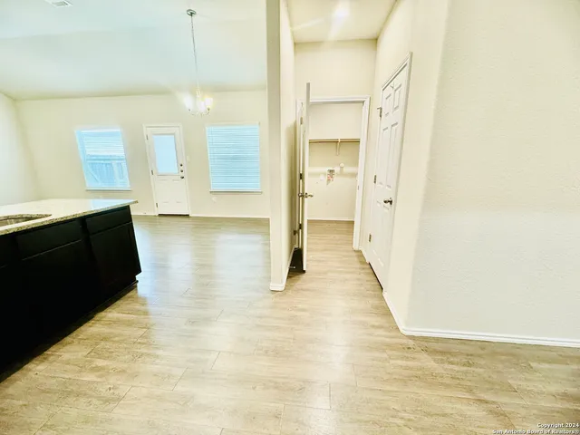 a view of a bathroom with a sink and a shower