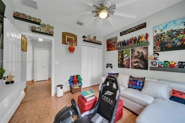 a view of a storage and utility room with washer and dryer