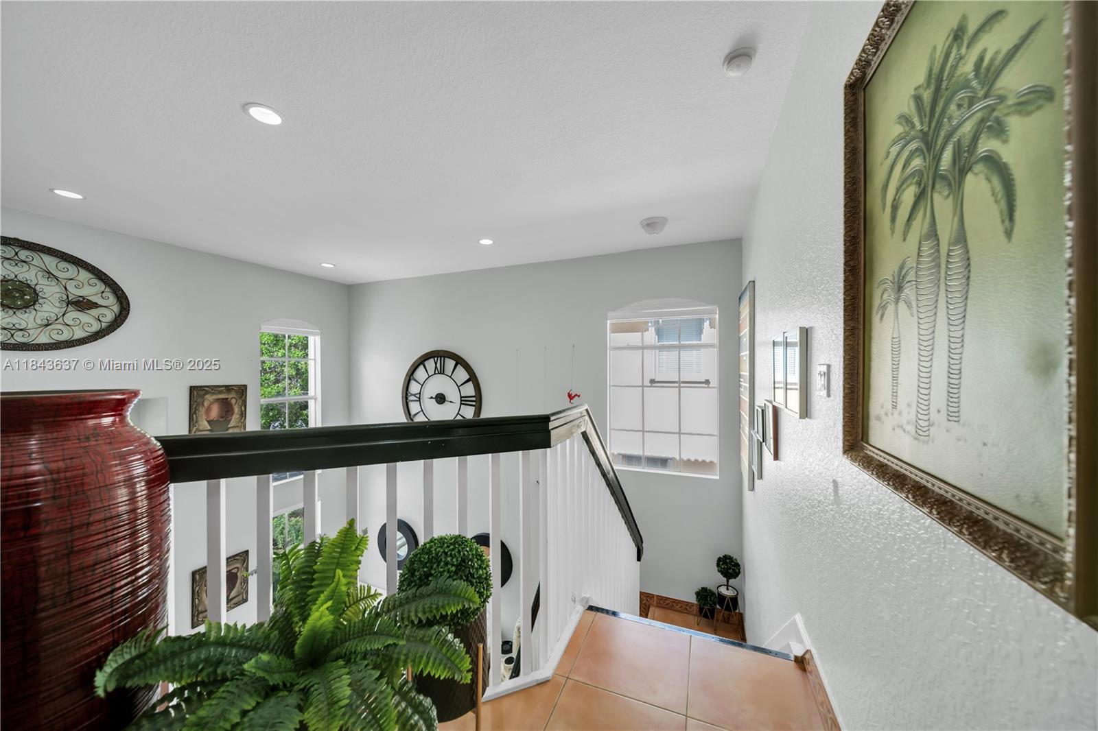 12355 Southwest 124th Terrace Miami, FL 33186 - Photo 23 of 38 a view of a hallway with wooden floor and stairs