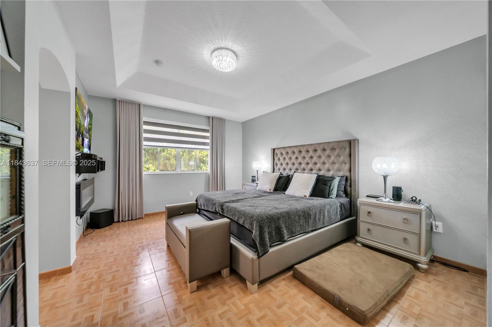 12355 Southwest 124th Terrace Miami, FL 33186 - Photo 26 of 38 a bedroom with a bed and a couch