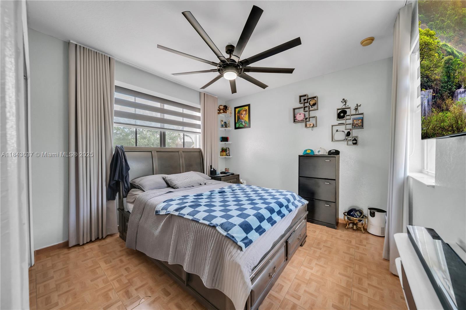 12355 Southwest 124th Terrace Miami, FL 33186 - Photo 34 of 38 a bedroom with a bed dresser and a window