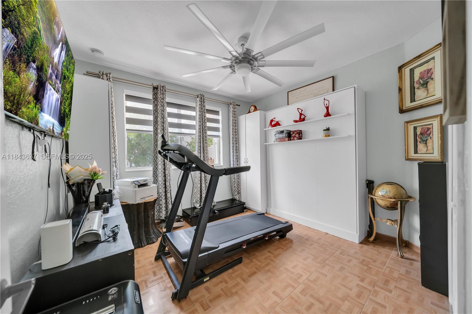 12355 Southwest 124th Terrace Miami, FL 33186 - Photo 36 of 38 a view of a room with gym equipment