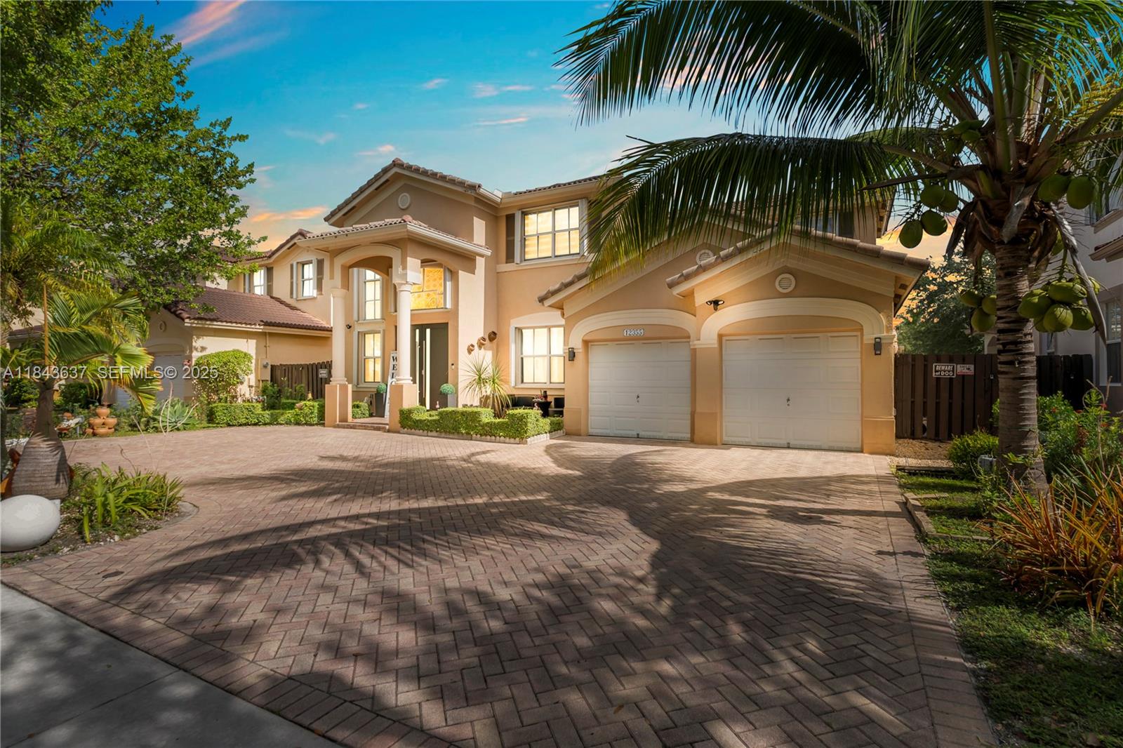12355 Southwest 124th Terrace Miami, FL 33186 - Photo 5 of 38 a front view of house with yard and green space