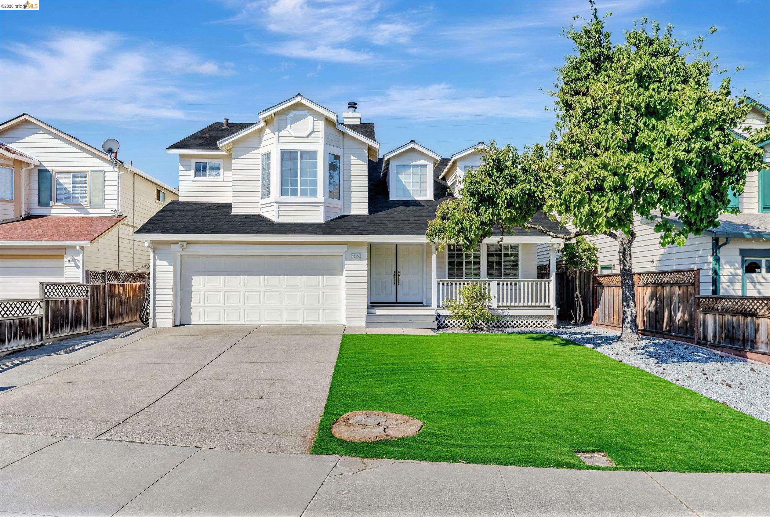 5052 Perry Way Antioch, CA 94531 - Photo 3 of 51 a front view of a house with a yard and trees