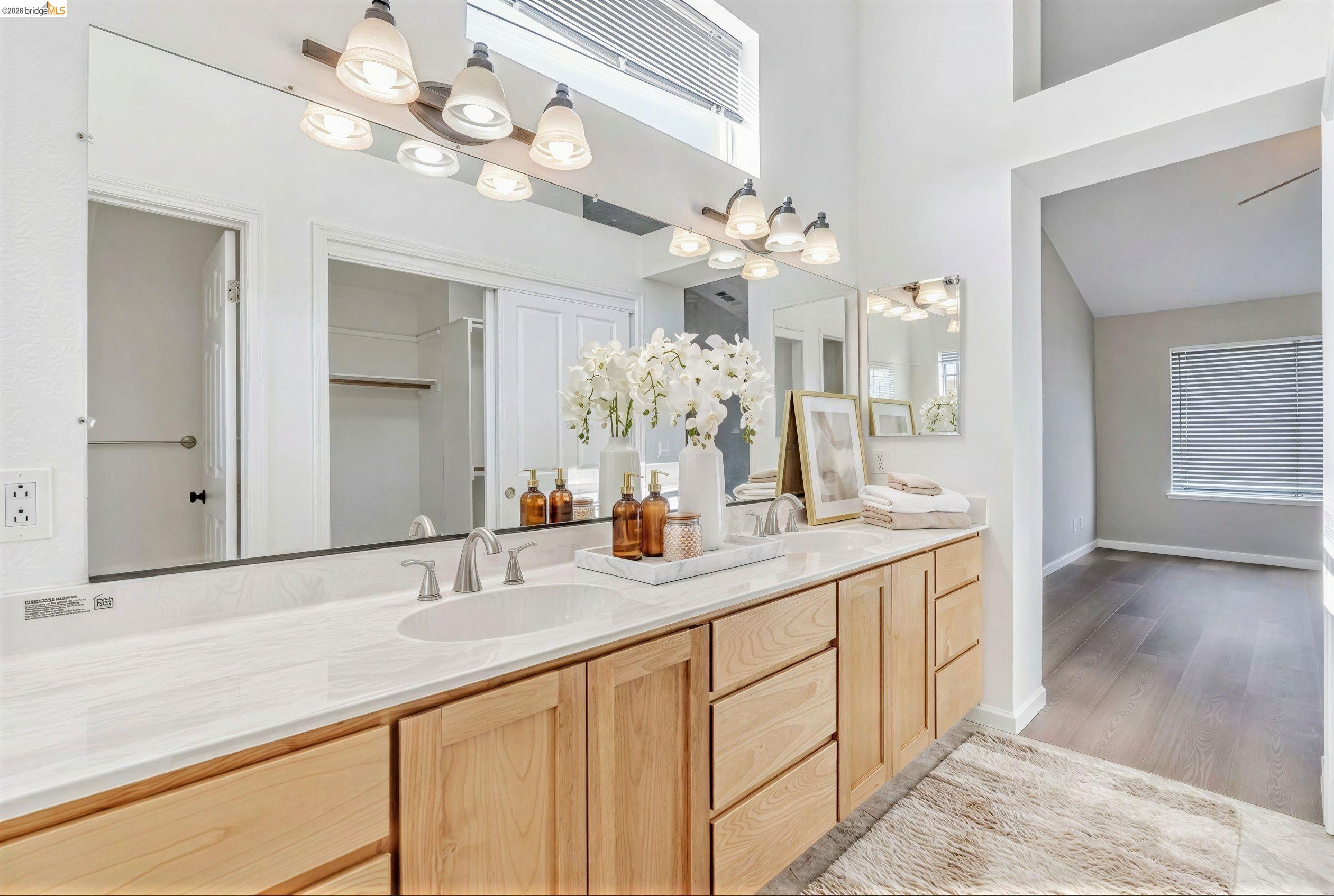 5052 Perry Way Antioch, CA 94531 - Photo 40 of 51 a bathroom with a granite countertop double vanity sink and a mirror