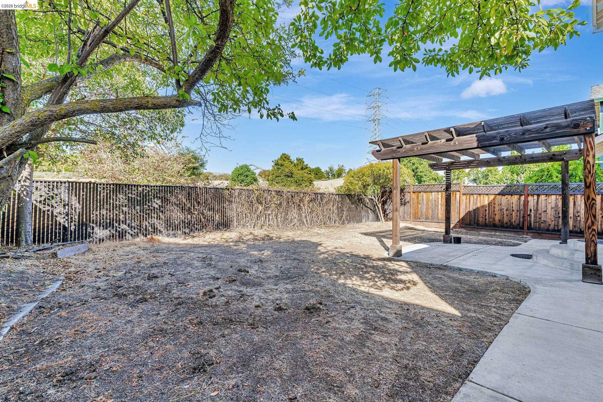 5052 Perry Way Antioch, CA 94531 - Photo 48 of 51 a view of a backyard with wooden fence