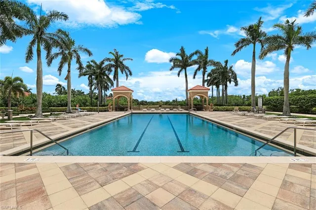 a picture of building with view of palm trees