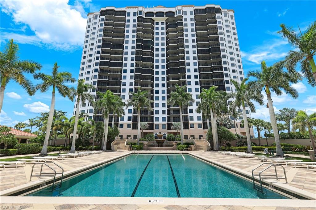 1060 Borghese Lane, Unit 902 Naples, FL 34114 - Photo 23 of 24 a picture of building with view of palm trees