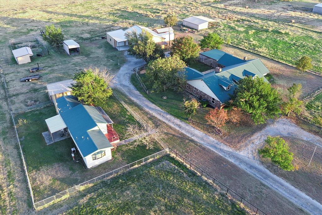 2300 Union Hill Road Sanger, TX 76266 - Photo 2 of 34 a view of a yard with an outdoor space