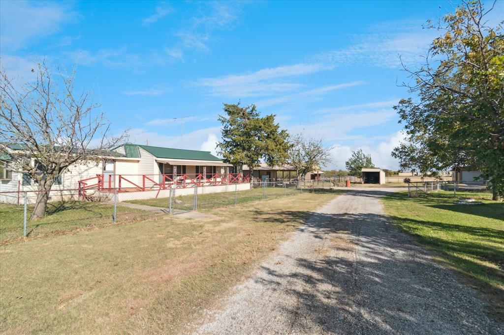 2300 Union Hill Road Sanger, TX 76266 - Photo 25 of 34 a view of swimming pool with outdoor seating and yard