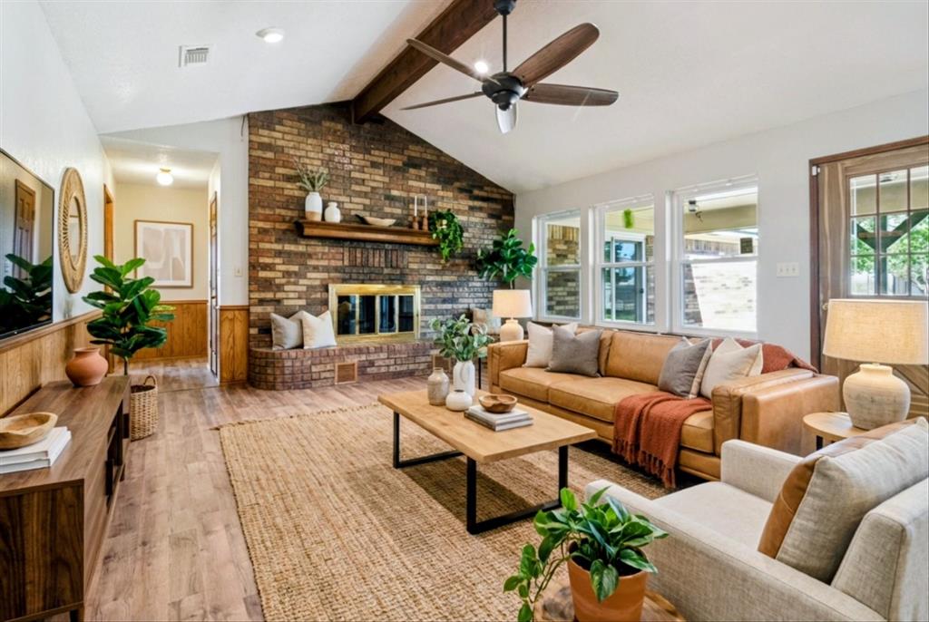 2300 Union Hill Road Sanger, TX 76266 - Photo 6 of 34 a living room with furniture ceiling fan and a large window