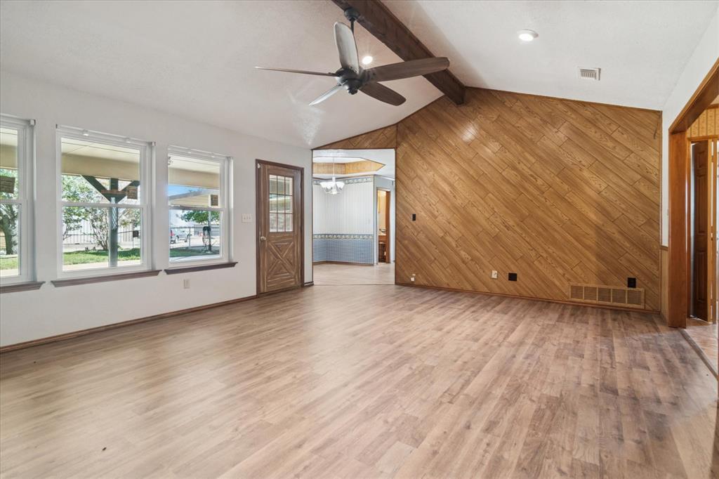 2300 Union Hill Road Sanger, TX 76266 - Photo 8 of 34 wooden floor in an empty room with a window