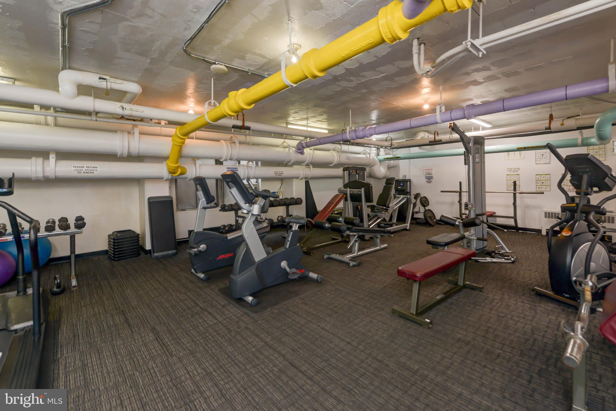 2475 Virginia Avenue Northwest, Unit 700 Washington, DC 20037 - Photo 28 of 36 a view of a room with gym equipment