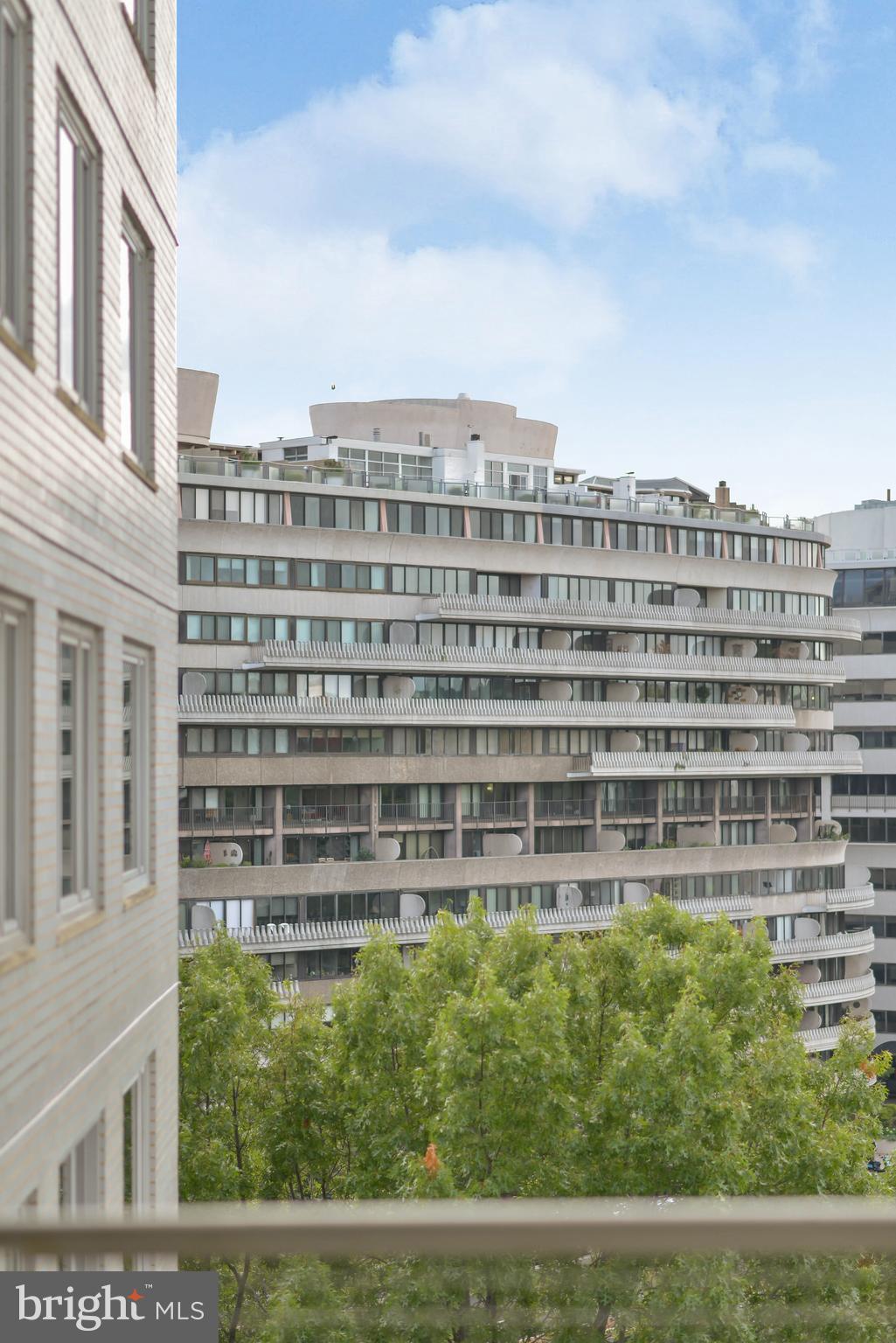 2475 Virginia Avenue Northwest, Unit 700 Washington, DC 20037 - Photo 10 of 36 a view of a building with a yard