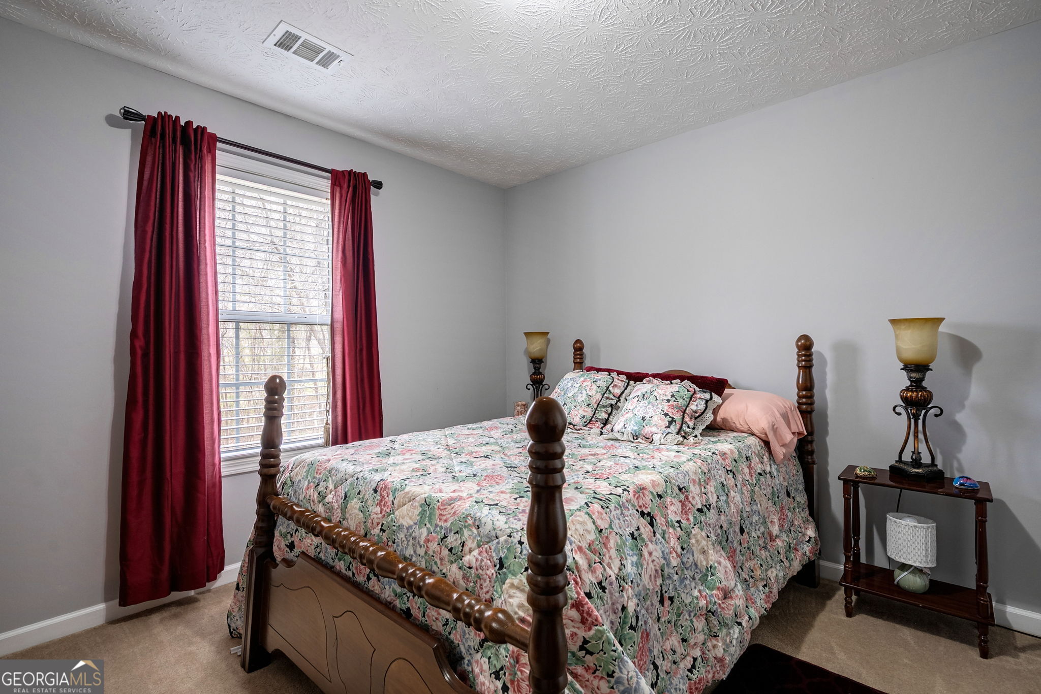 1415 Blanding Way Winder, GA 30680 - Photo 29 of 39 a bedroom with a bed and a window