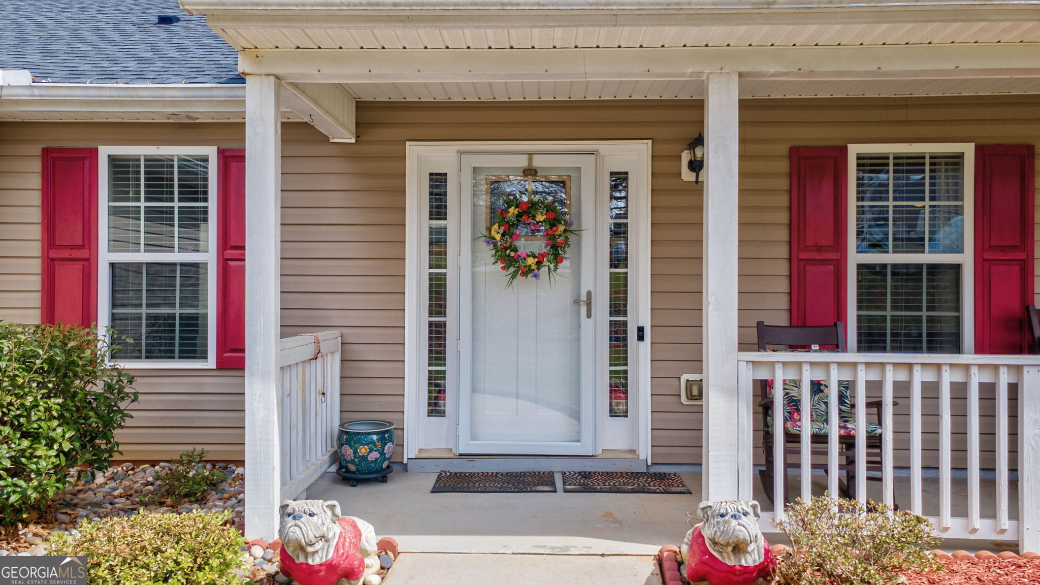 1415 Blanding Way Winder, GA 30680 - Photo 10 of 39 a front view of a house with a garage