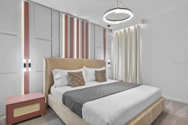 a bathroom with a sink toilet a mirror and shower