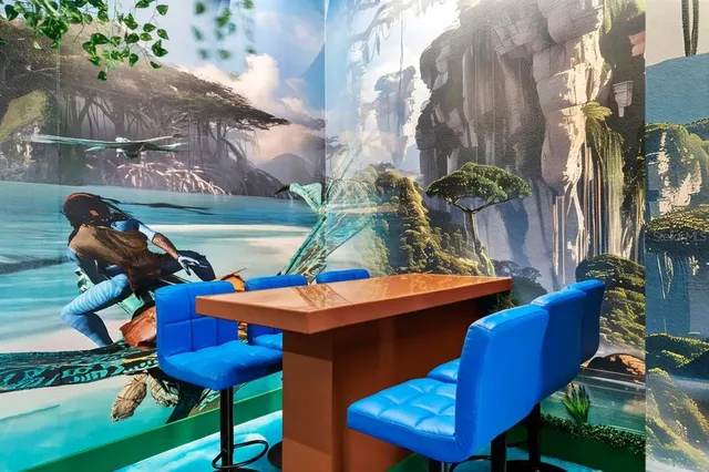 an aerial view of residential houses with outdoor space and trees all around