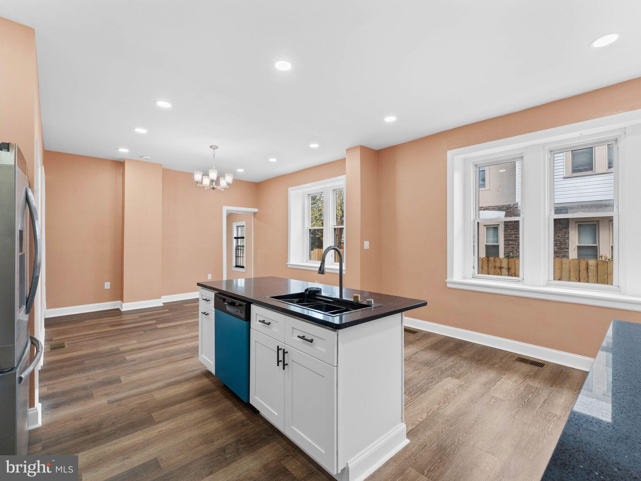 413 High Street Philadelphia, PA 19144 - Photo 12 of 37 a kitchen with stainless steel appliances granite countertop a sink and cabinets