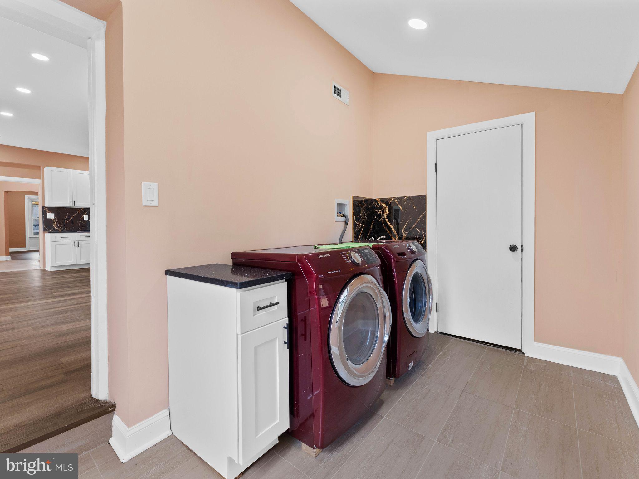 413 High Street Philadelphia, PA 19144 - Photo 18 of 37 a utility room with dryer and washer