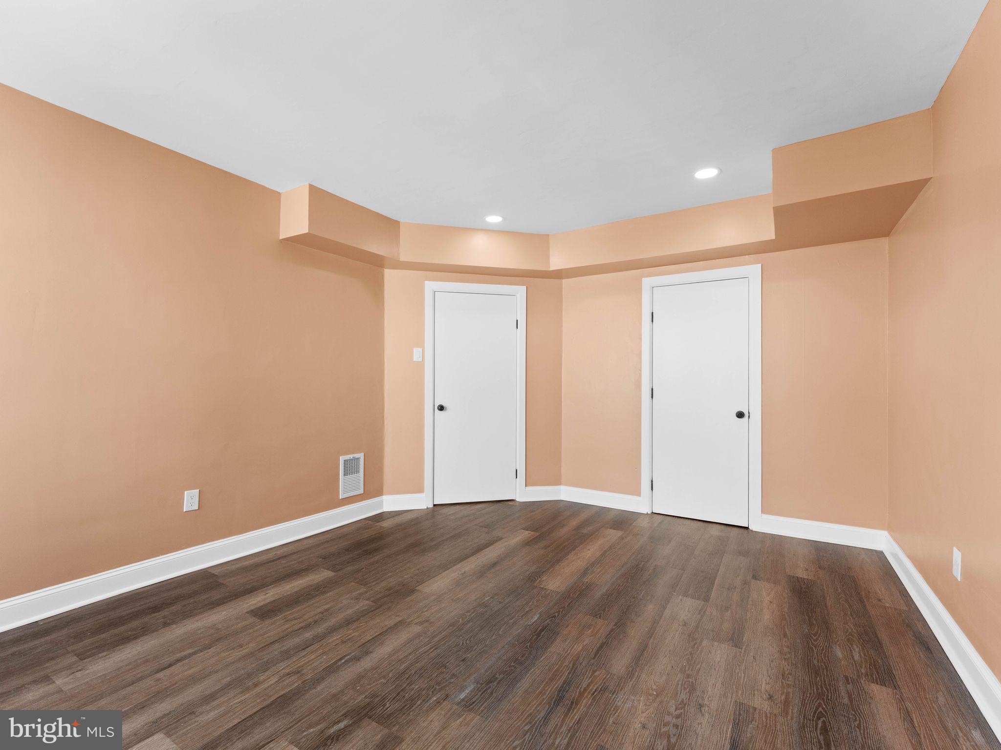 413 High Street Philadelphia, PA 19144 - Photo 22 of 37 a view of an empty room with wooden floor