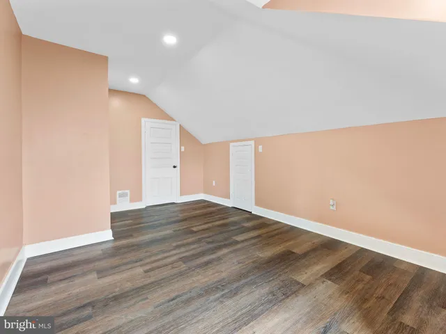 a white bath tub sitting in a bathroom