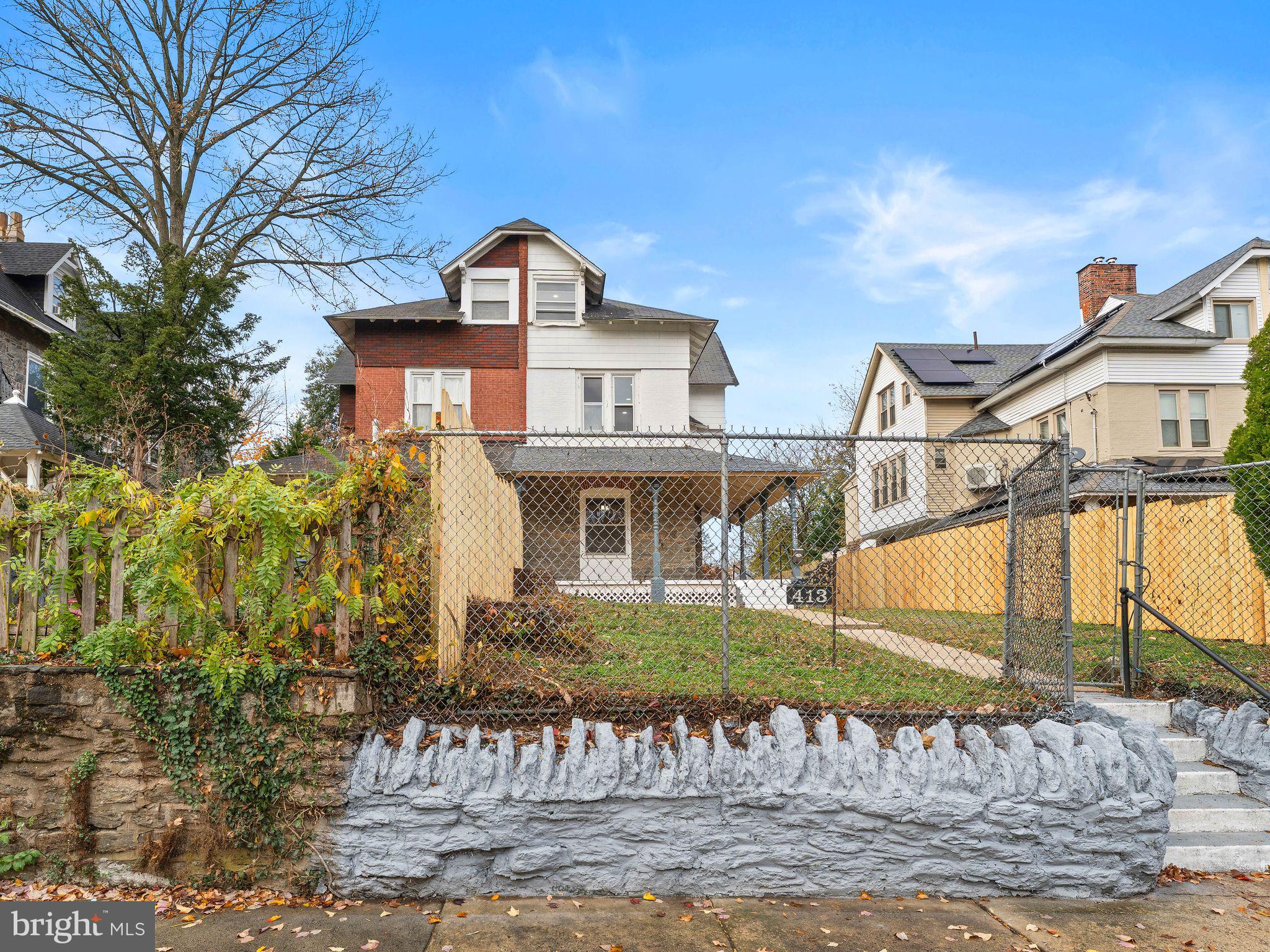 413 High Street Philadelphia, PA 19144 - Photo 36 of 37 a front view of a house with a yard