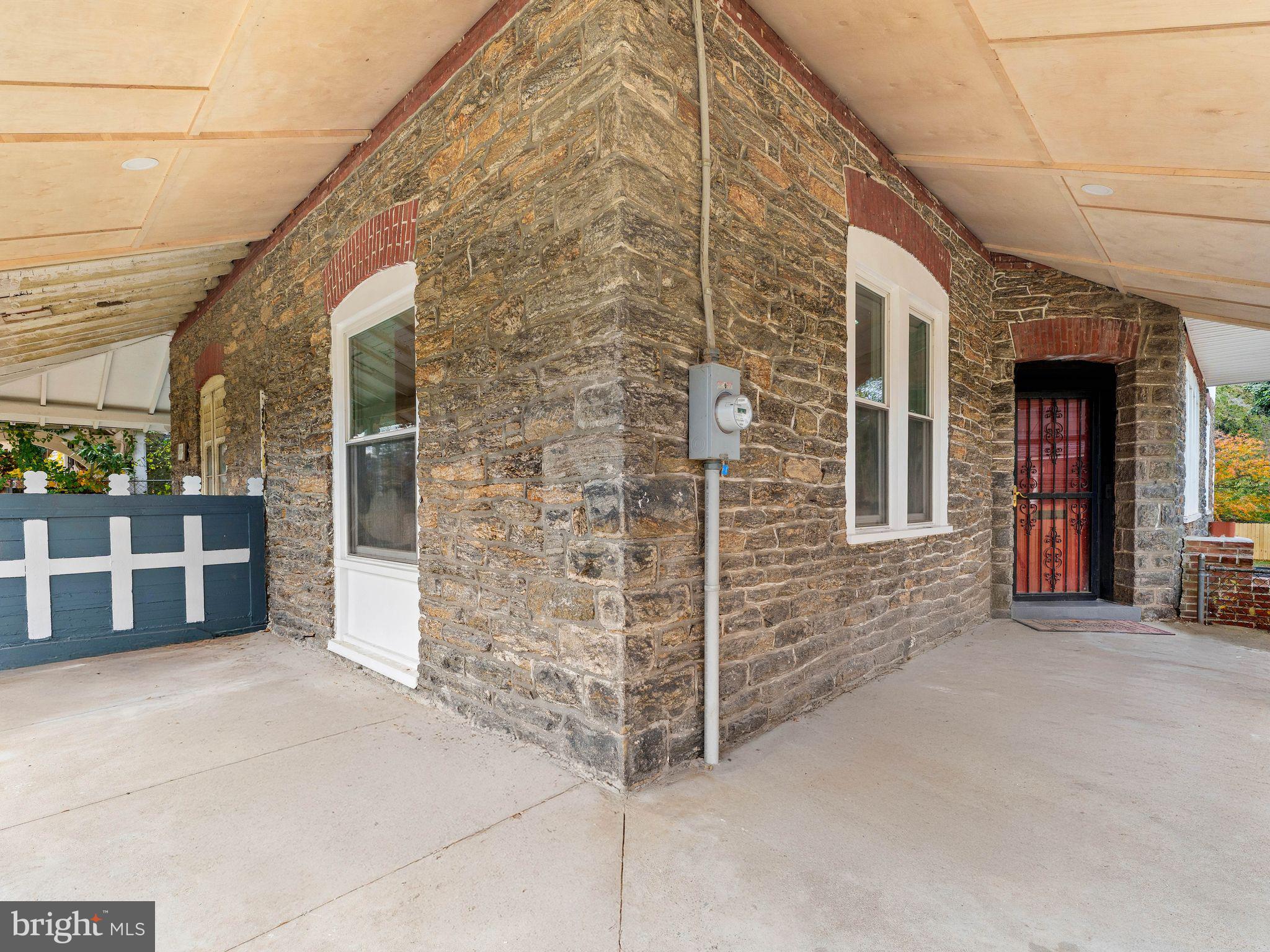 413 High Street Philadelphia, PA 19144 - Photo 7 of 37 a view of a brick house with large windows