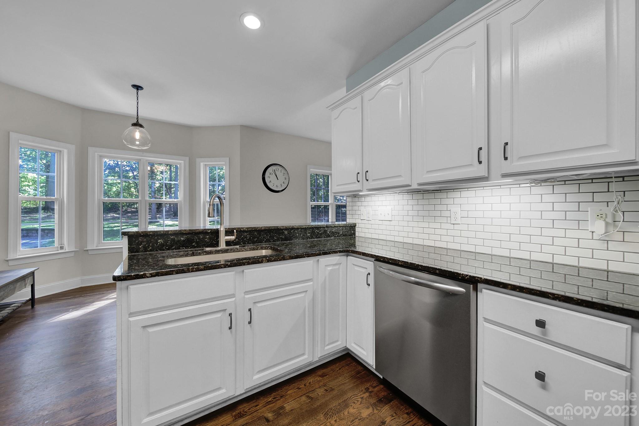 16014 Virginia Lee Court Fort Mill, SC 29708 - Photo 14 of 47 a kitchen with granite countertop a sink and cabinets