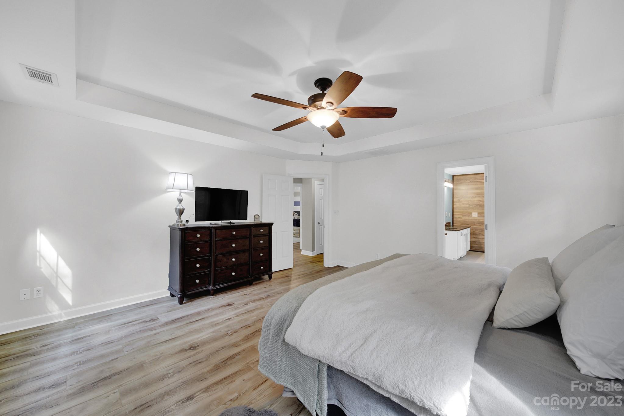 16014 Virginia Lee Court Fort Mill, SC 29708 - Photo 22 of 47 a living room with furniture and a flat screen tv