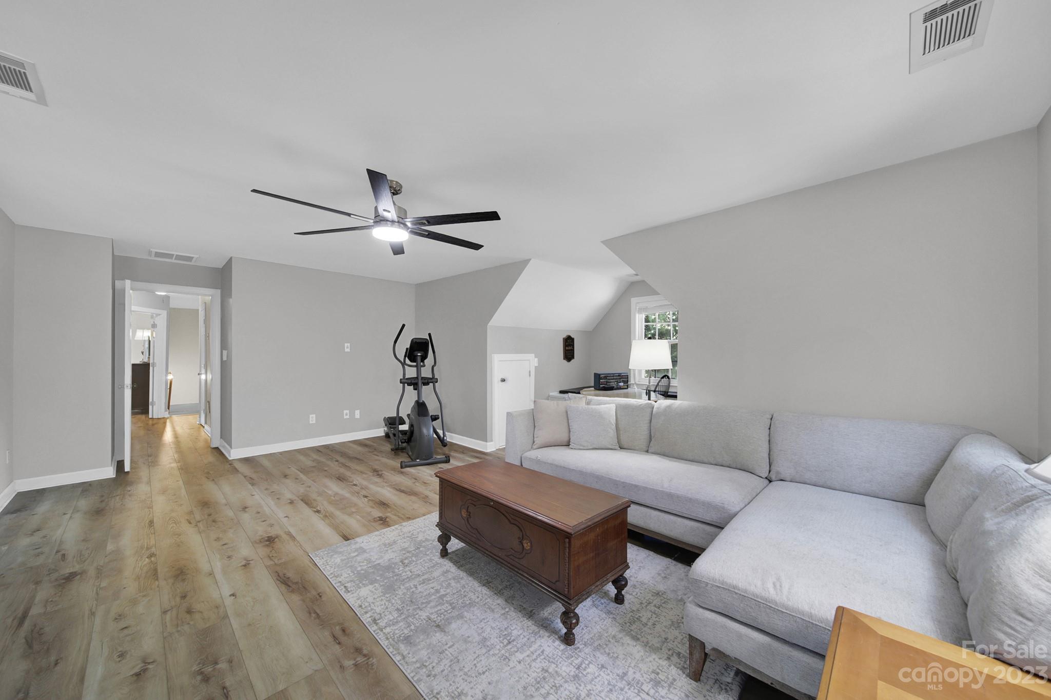 16014 Virginia Lee Court Fort Mill, SC 29708 - Photo 34 of 47 a living room with furniture and a wooden floor