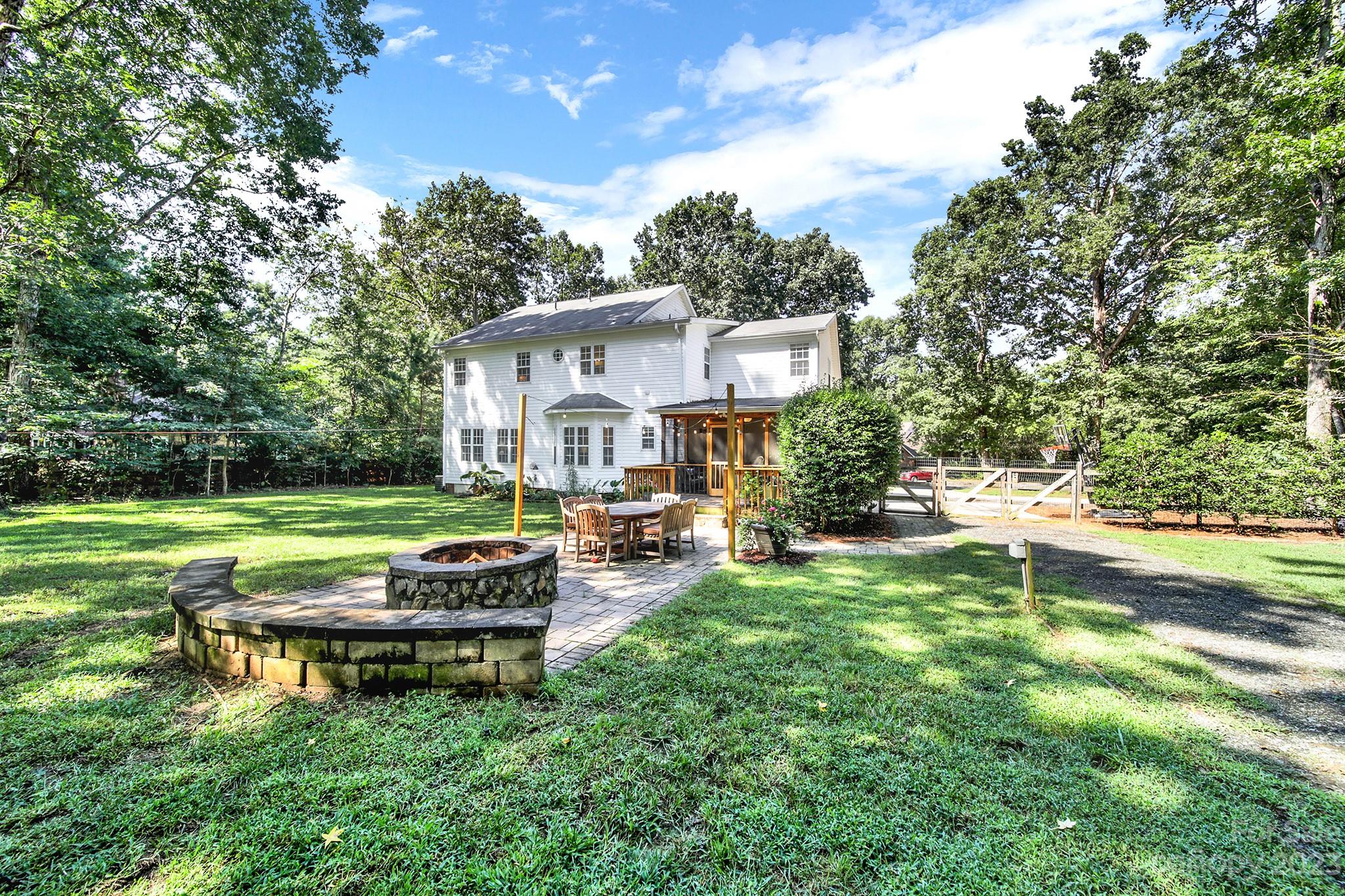 16014 Virginia Lee Court Fort Mill, SC 29708 - Photo 39 of 47 a front view of a house with garden