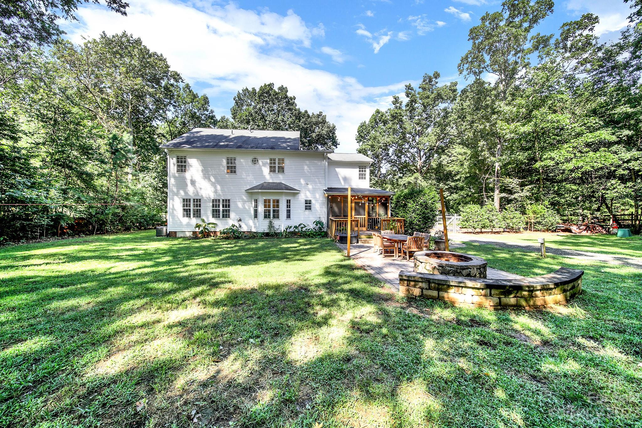 16014 Virginia Lee Court Fort Mill, SC 29708 - Photo 40 of 47 a view of a house with yard and sitting area