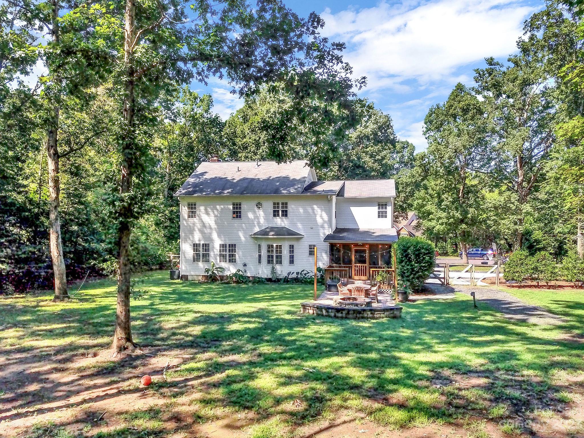 16014 Virginia Lee Court Fort Mill, SC 29708 - Photo 46 of 47 a view of a house with a big yard plants and large trees