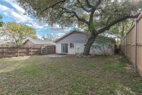 a house with trees in front of it