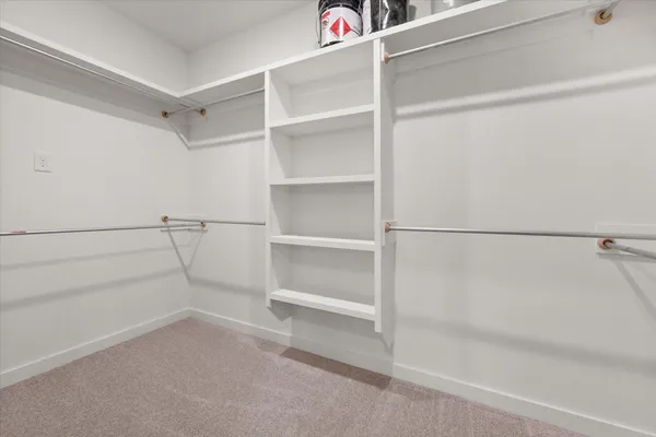 a view of an empty walk in closet
