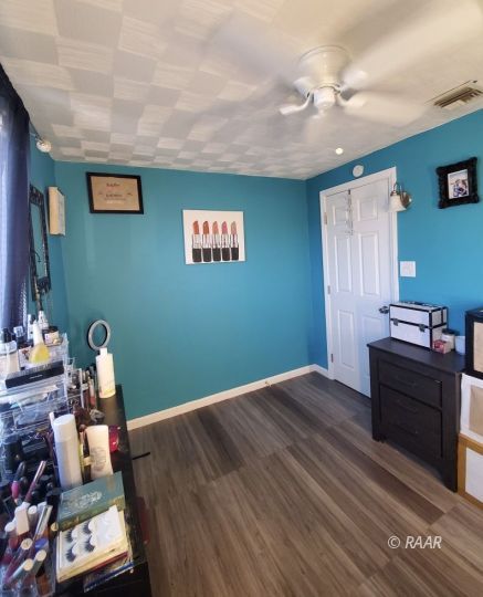 425 North Norma Street Ridgecrest, CA 93555 - Photo 26 of 33 a bed room with furniture and a window