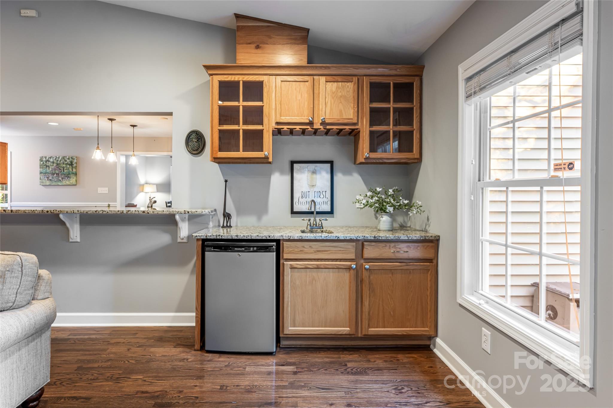 315 Glenn Bridge Road Arden, NC 28704 - Photo 14 of 45 a kitchen with stainless steel appliances granite countertop a stove and a large window