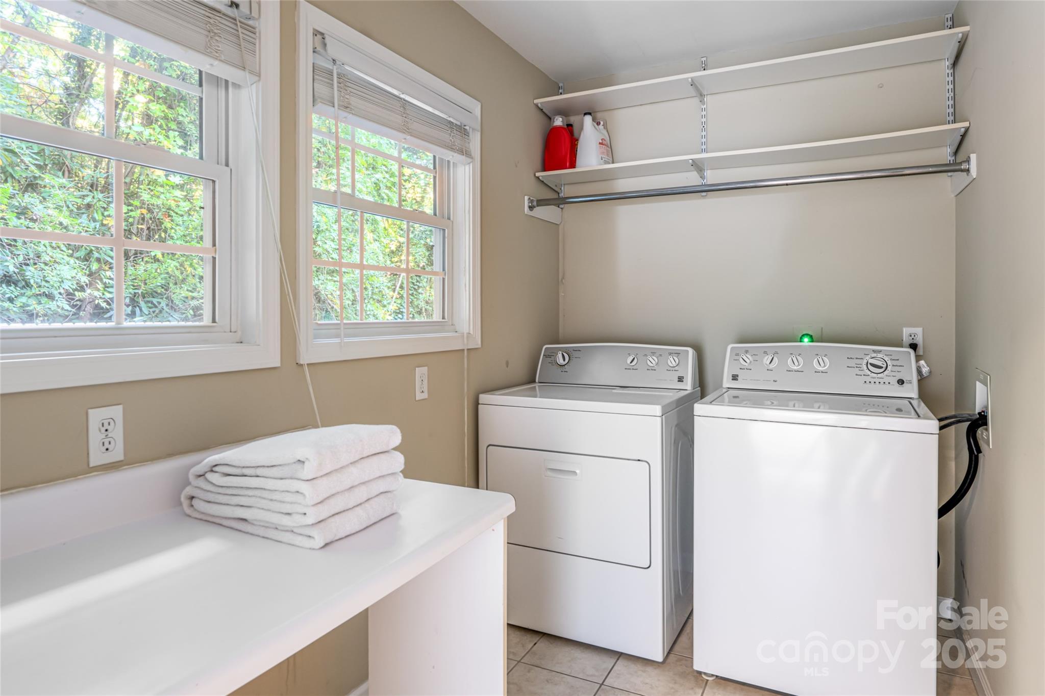 315 Glenn Bridge Road Arden, NC 28704 - Photo 21 of 45 a utility room with dryer and washer