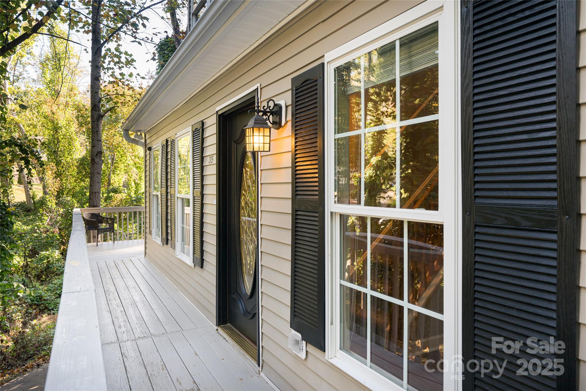 315 Glenn Bridge Road Arden, NC 28704 - Photo 3 of 45 a view of a house with a large window