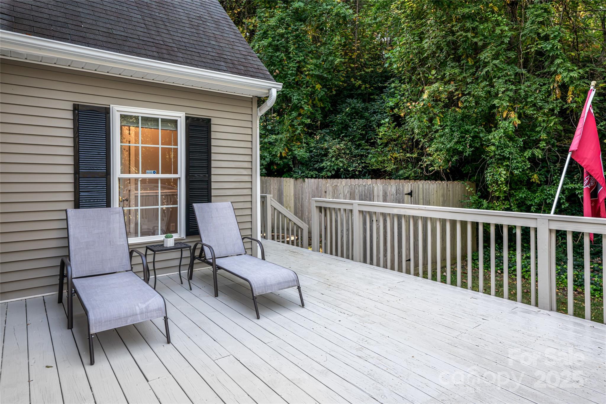 315 Glenn Bridge Road Arden, NC 28704 - Photo 38 of 45 a balcony with wooden floor and furniture