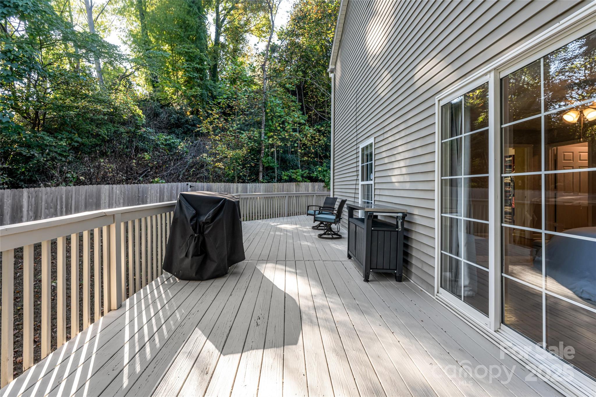 315 Glenn Bridge Road Arden, NC 28704 - Photo 39 of 45 a view of a balcony with wooden floor and fence