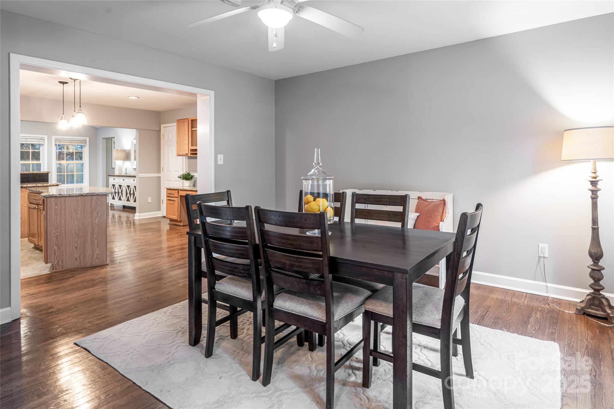 315 Glenn Bridge Road Arden, NC 28704 - Photo 6 of 45 a view of a dining room with furniture and wooden floor