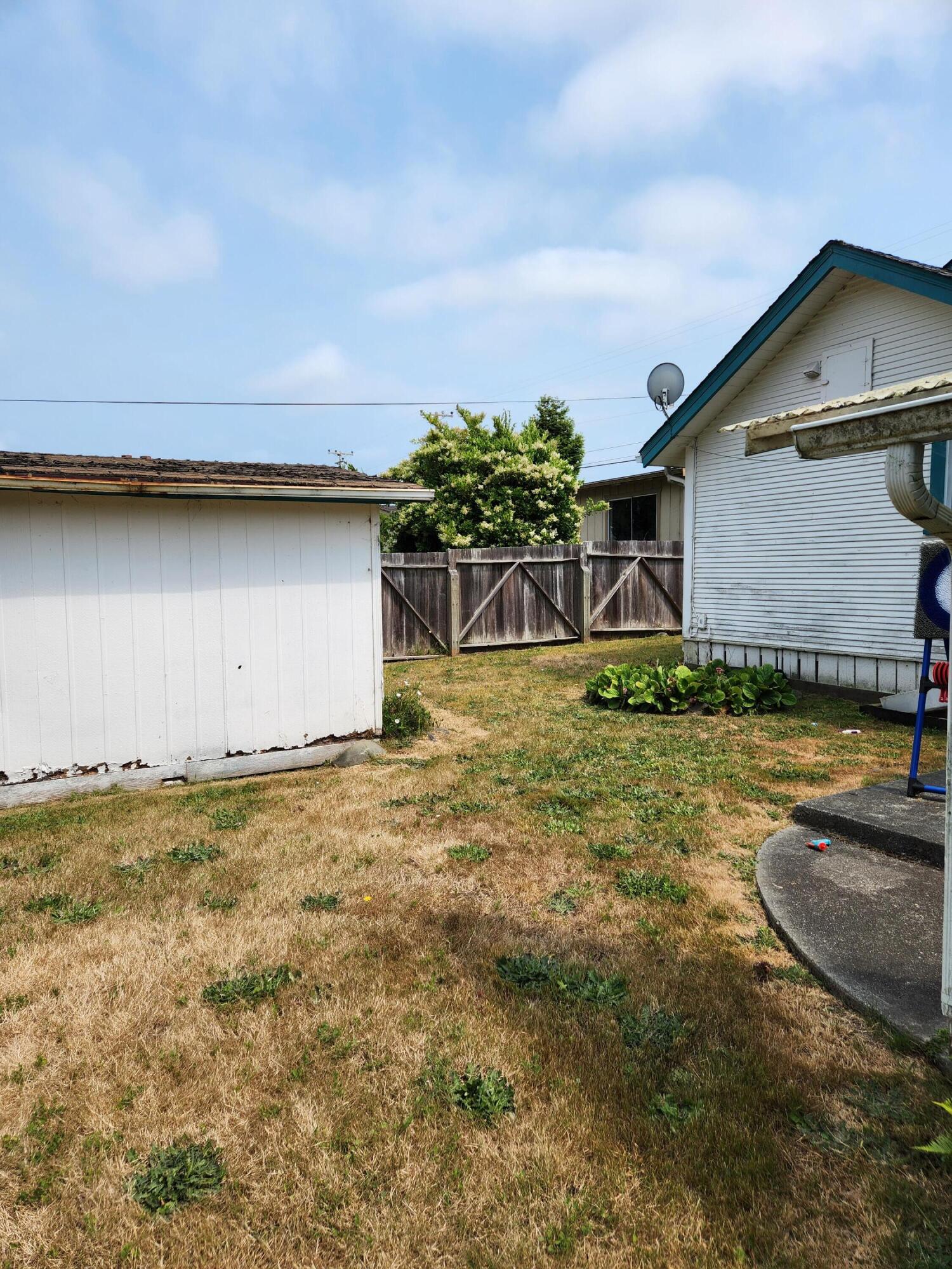 2163 Fern Street Cutten, CA 95503 - Photo 8 of 23 a backyard of a house with lots of green space