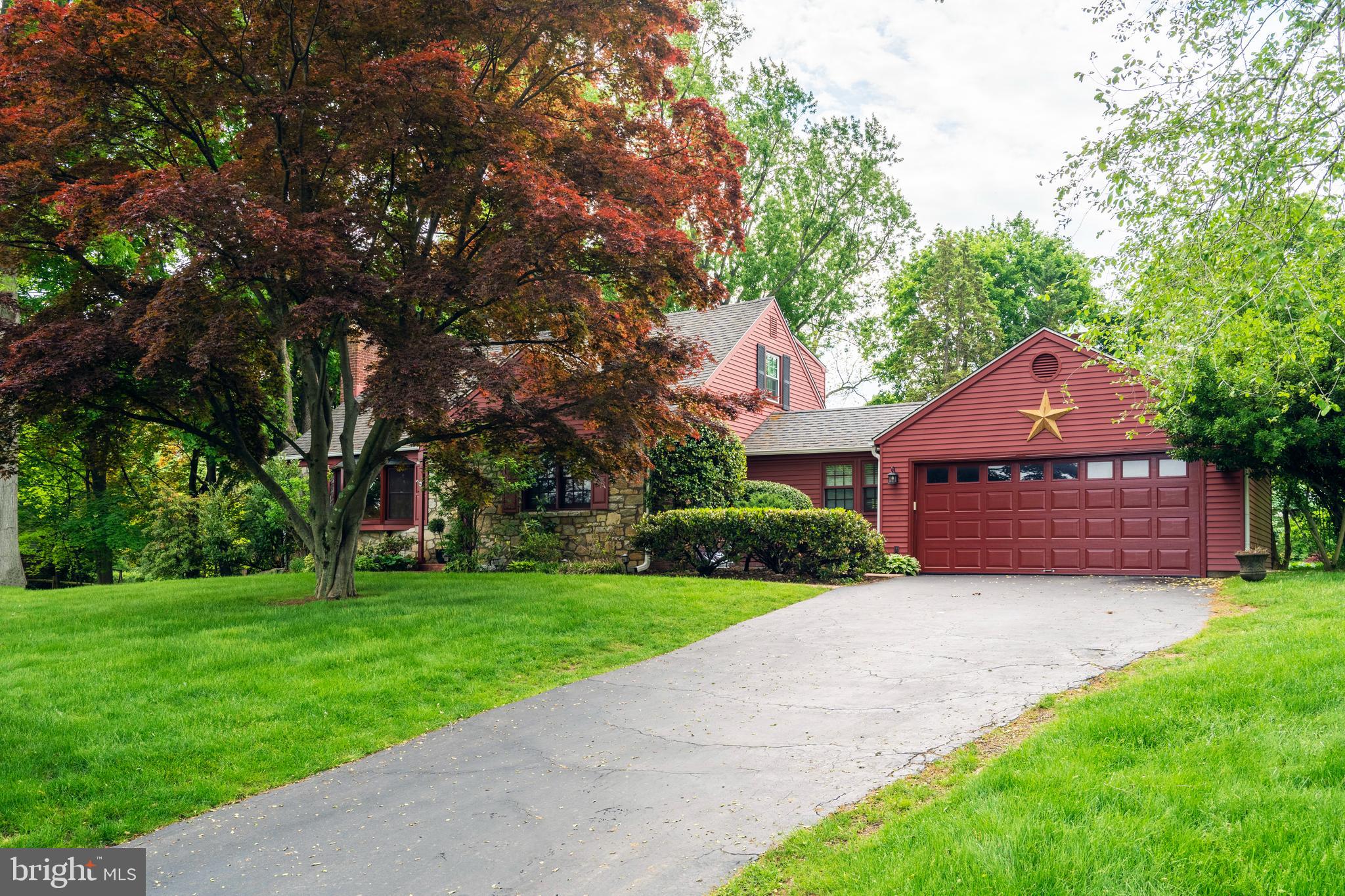 a house view with a garden space