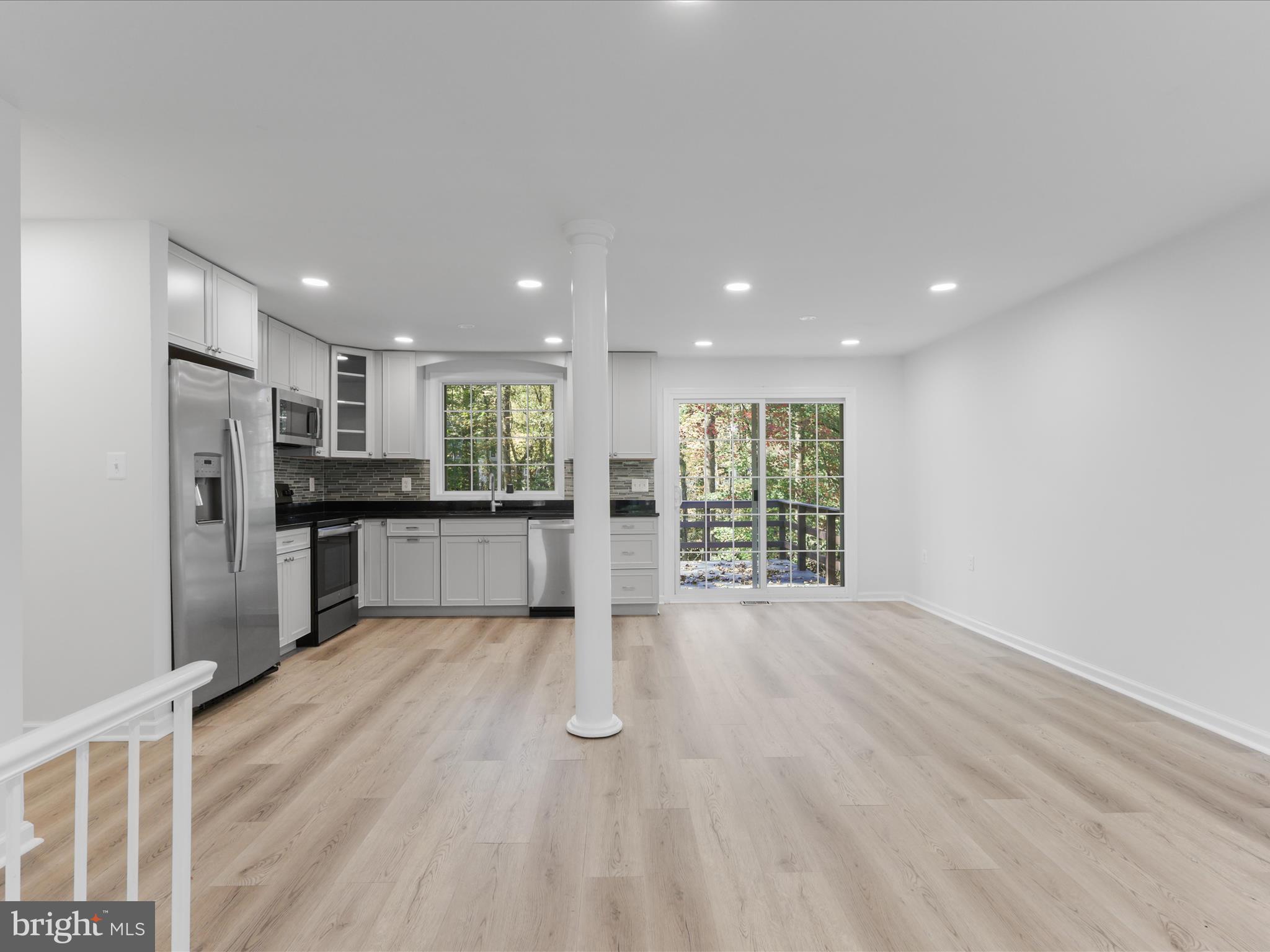 2369 Old Trail Drive Reston, VA 20191 - Photo 12 of 50 a view of kitchen with refrigerator sink and stove