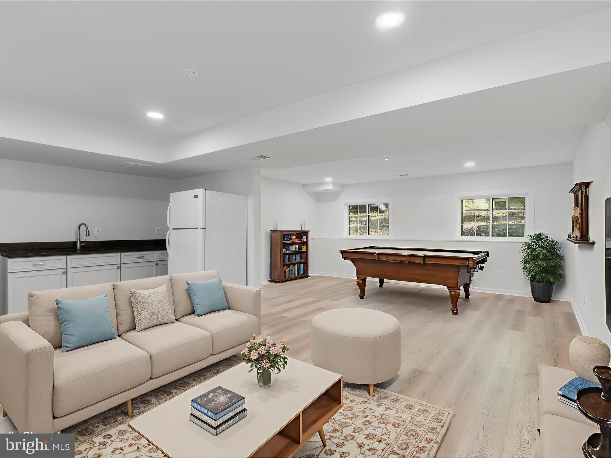 2369 Old Trail Drive Reston, VA 20191 - Photo 31 of 50 a living room with furniture and a rug