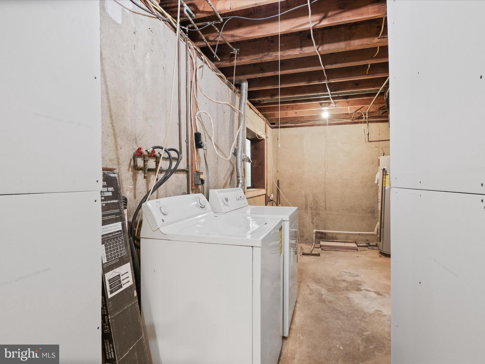 2369 Old Trail Drive Reston, VA 20191 - Photo 34 of 50 a utility room with dryer and washer