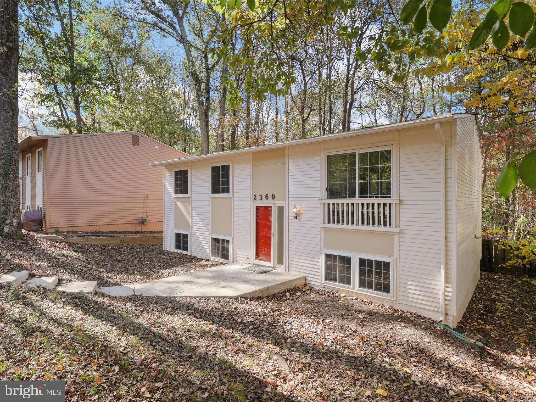 2369 Old Trail Drive Reston, VA 20191 - Photo 5 of 50 a view of a house with a house and a tree