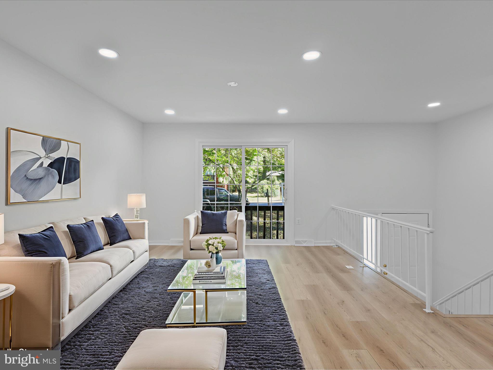 2369 Old Trail Drive Reston, VA 20191 - Photo 8 of 50 a living room with furniture and a large window